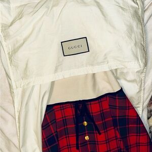 Gucci Red, Crème and Black Asymmetrical Dress with Gucci ivory dress cover.